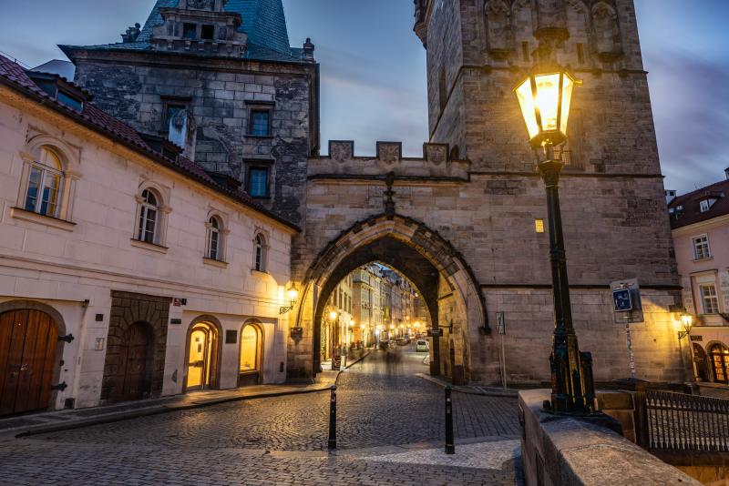 Medieval archway and cobblestones.