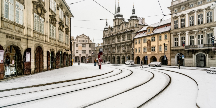 Lines of the tram track showing through the snow