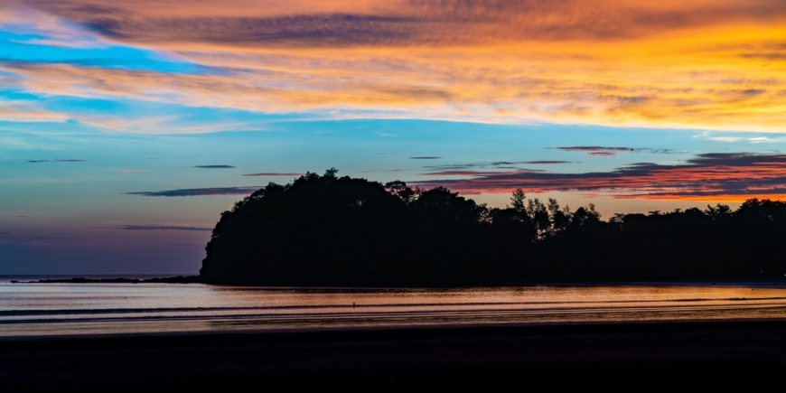 Sunset over the point and Small Cave